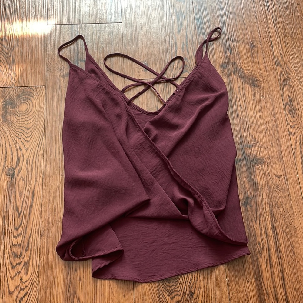Burgundy drop top, criss cross in the center across chest, size extra small